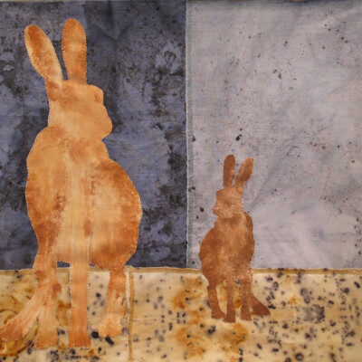 Broderad bild av två harar,blå bakgrund
